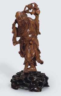 19TH CENTURY A BOXWOOD CARVING OF DONGFANG SHUO